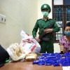 Bắt một phụ nữ giấu 12.000 viên ma túy tổng hợp trong bao gạo